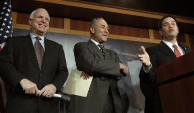 (L-R) U.S. Senators John McCain (R-AZ), Charles Schumer (D-NY), and Marco Rubio (R-FL) attend a news conference on comprehensive immigration reform at the U.S. Capitol in Washington January 28, 2013.