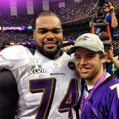 Baltimore Ravens offensive tackle Michael Oher and his adoptive brother, Sean Tuohy, Jr. pose after the Ravens won Super Bowl XLVII on Sunday, Feb. 3.