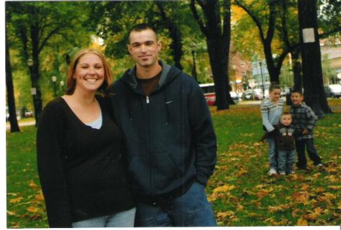 Melissa,decorator/designer and Aaron Klein, baker, with their children in the background.