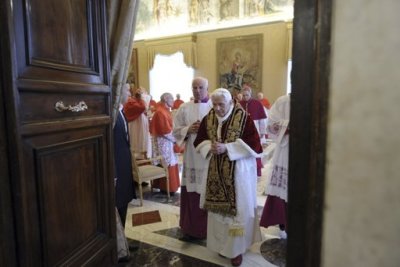 Pope Benedict XVI leaves at the end of a consistory at the Vatican February 11, 2013, in this picture provided by Osservatore Romano. Pope Benedict said on Monday he will resign on Feb 28 because he no longer has the strength to fulfil the duties of his office, becoming the first pontiff since the Middle Ages to take such a step.