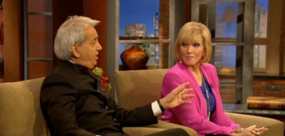 Benny and Suzanne Hinn are seen in an image taken from a video of their 2012 appearance on the Christian Broadcasting Network (CBN).