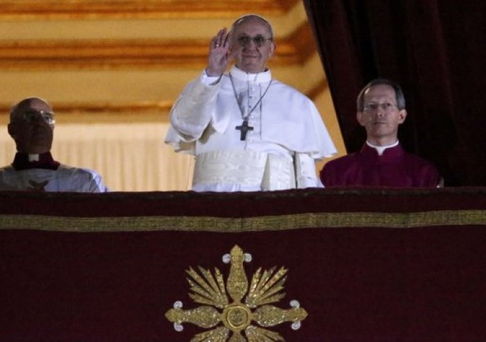 Newly elected Pope Francis, Cardinal Jorge Mario Bergoglio of Argentina appears on the balcony of St. Peter's Basilica after being elected by the conclave of cardinals, at the Vatican, March 13, 2013. White smoke rose from the Sistine Chapel chimney and the bells of St. Peter's Basilica rang out on Wednesday, signaling that Roman Catholic cardinals had elected a pope to succeed Benedict XVI.