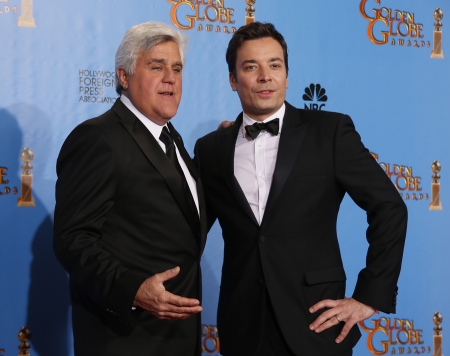 Late night talk show hosts Jay Leno (L) and Jimmy Fallon pose backstage at the 70th annual Golden Globe Awards in Beverly Hills, California, January 13, 2013.