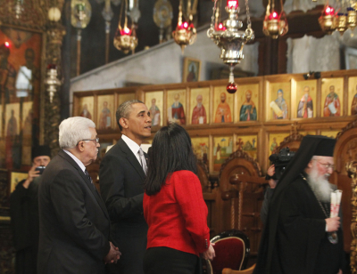 U.S. President Barack Obama tours the Church of the Nativity with Palestinian President Mahmoud Abbas (L) in Bethlehem March 22, 2013.