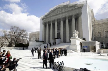 Attorneys David Bois (L) and Ted Olson (R), who argued against the California law Proposition 8, arrive to speak to the media after arguing their case before the Supreme Court in Washington March 26, 2013. U.S. Supreme Court justices signaled on Tuesday that they are reluctant to embrace a broad ruling finding a fundamental right to marriage for gays and lesbians across the United States.