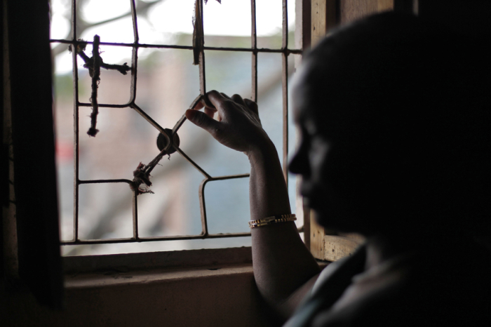 Theresa Kerketa, a 45 year old, poses for a picture at her residence on the outskirts of New Delhi in this 2012 file photo. Kerketa was rescued by Bachpan Bachao Andolan (Save the Childhood Movement), a charity which rescues victims of bonded labour. There are no reliable figures for how many people are trafficked for domestic servitude. The Indian government says 126,321 trafficked children were rescued from domestic work in 2011/12, a rise of almost 27 percent from the previous year. Activists say if you include women over 18 years, the figure could run into the hundreds of thousands.