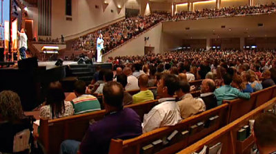 Jim Putman, founder and senior pastor of Real Life Ministries in Post Falls, Idaho, speaks Tuesday, April 23, 2013, at the 2013 Exponential Conference in Orlando, Fla.