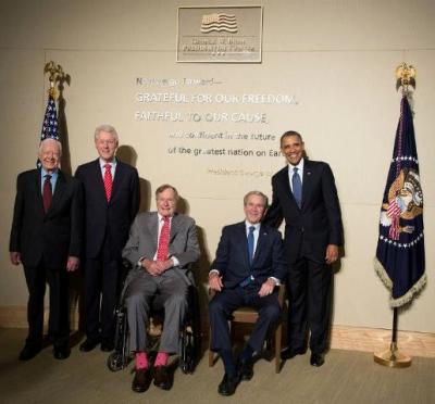 Former Presidents from left: Jimmy Carter, Bill Clinton, George H.W. Bush, George W. Bush and President Barack Obama at the dedication ceremony for the George W. Bush Library, Museum and Institute on the campus of Southern Methodist University in Dallas, Texas, on April 25, 2013.