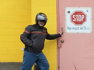 Real estate developer Don Finelli, 65, poses incognito, at an entrance to the Fantasy World Adult Book Store in New Jersey