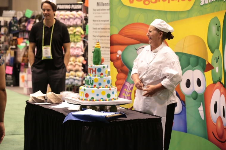 VeggieTales creator Michael Nawrocki (l) observes the VeggieTales exhibit at the International Christian Retail Show in St. Louis, Mo., on Monday June 24, 2013.