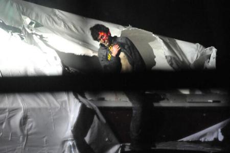 Tsarnaev, collapsed right before capture, with a sniper's laser on head.