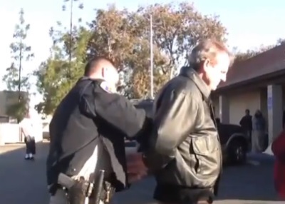 Pastor Mark Mackey of Hemet, Calif. is arrested in front of the Hemet DMV for preaching bible verses in Feb. 2011.