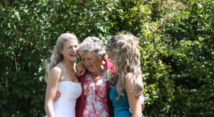 Jennifer Nock (l) recovers nicely after her grandmother (c) douses her with a glass of Pimm's at her wedding party.