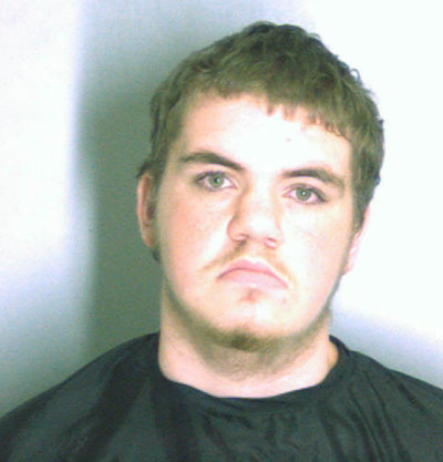 DeKalb County Sheriff's Office photo shows Michael Brandon Hill on Aug. 21, 2013. Police arrested Hill, 20, on Tuesday for opening fire with an AK-47 inside an elementary school in the Atlanta suburbs, forcing the evacuation of 800 students who were all reunited with their parents without injury, officials said.