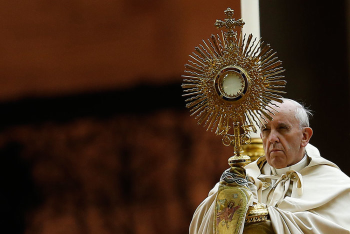 Pope Francis blesses during a prayer calling for peace in Syria, at St. Peter's Square at the Vatican September 7, 2013. A sombre-looking Pope Francis made an impassioned appeal before 100,000 people on Saturday to avert a widening of Syria's conflict, urging world leaders to pull humanity out of a 'spiral of sorrow and death'.