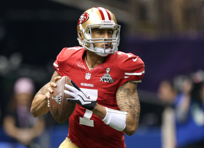 San Francisco 49ers quarterback Colin Kaepernick looks to pass during the first quarter in the NFL Super Bowl XLVII football game against the Baltimore Ravens in New Orleans, Louisiana, February 3, 2013.