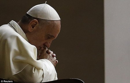 Pray for peace: Pope Francis takes part in a vigil after writing to G20 leaders as he calls for a peaceful resolution in Syria.