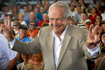 Evangelical Christian leader Pat Robertson takes his seat onstage ahead of a campaign rally with Republican presidential candidate and former Massachusetts Governor Mitt Romney in Virginia Beach, Va., on Sept. 8, 2012.