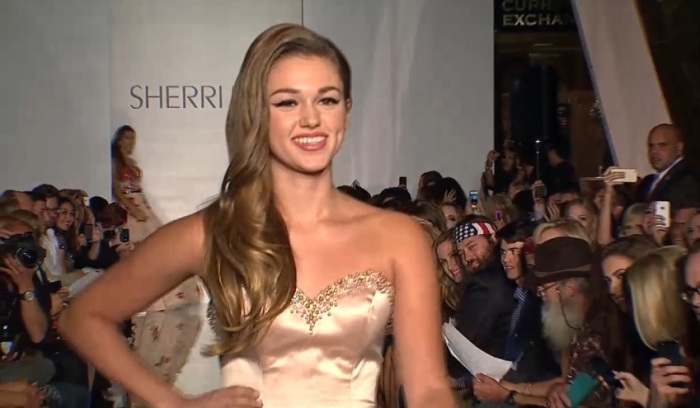 Sadie Robertson walks the runway during the Evening By Sherri Hill Spring 2014 show at Trump Tower on September 9, 2013 in New York City.