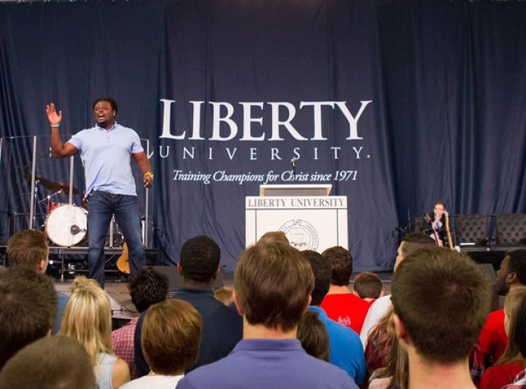 Derwin Gray, founder and pastor of Transformation Church and author of 'Limitless Life' speaks to 10,000 students at Liberty University's convocation in Lynchburg, Va., on Sept. 6, 2013.