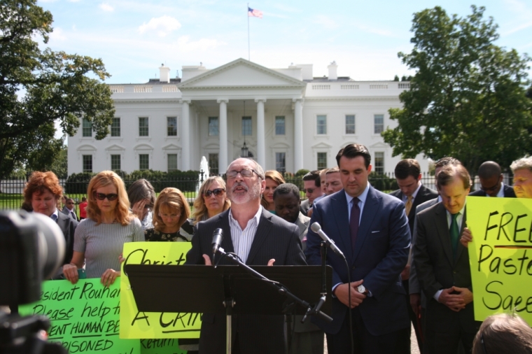 The Rev. Pat Mahoney, director of the Christian Defense Coalition in Washington, D.C. leads the vigil in prayer for pastor Abedini.