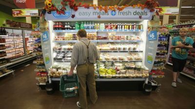 A man shops for groceries.