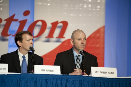 Liberty Institute General Counsel Jeff Mateer listens intently as Senior Master Sergeant Phillip Monk shares his story of religious freedom violation at the Family Research Council's Values Voter Summit on Saturday, Oct. 12, 2013, in Washington, D.C.