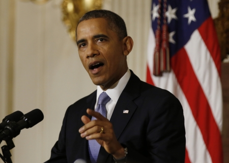 U.S. President Barack Obama delivers remarks on the end of the U.S. government shutdown in the State Dining Room of the White House in Washington, October 17, 2013. The U.S. Congress on Wednesday approved an 11th-hour deal to end a partial government shutdown and pull the world's biggest economy back from the brink of a potentially historic debt default that could have threatened financial calamity.