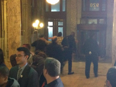 A same-sex marriage protester is removed from Newark's City Hall on Monday, Oct. 21, 2013, after declaring that gay marriage was 'unlawful in the eyes of God and Jesus Christ.'