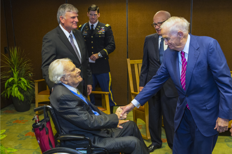 Billy Graham, Franklin Graham, Edward Graham, Rupert Murdoch, Bill Marriott, Jr. talk at a celebration for Graham's 95th birthday in Asheville on Nov. 7, 2013.