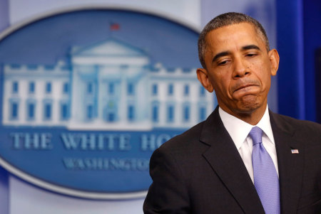 U.S. President Barack Obama pauses while talking about the Affordable Care Act in the Brady Press Briefing Room at the White House in Washington, November 14, 2013. Obama bowed to political pressure from his fellow Democrats on Thursday and announced a plan to let insurers renew for one year the health plans for Americans whose policies would be otherwise canceled due to Obamacare.