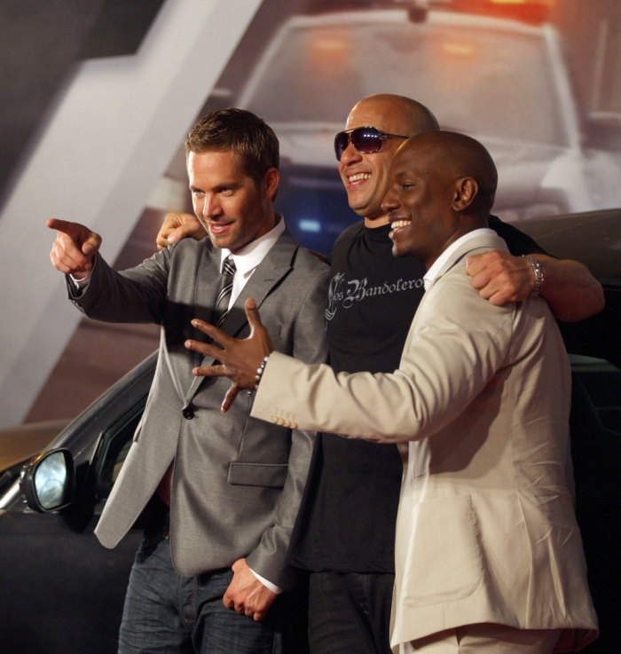 Actors (L-R) Paul Walker, Vin Diesel and Tyrese Gibson pose at the world premiere of 'Fast Five' at the Cinepolis Lagoon theatre in Rio de Janeiro April 15, 2011. The movie, the fifth in the Fast and Furious film series, opens in theaters on April 29.