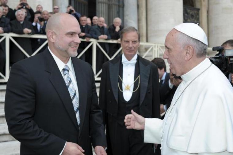 Canadian sculptor Tim Schmalz meets Pope Francis at St. Peter’s Square in Vatican City, Rome, Italy, on Nov. 20, 2013.