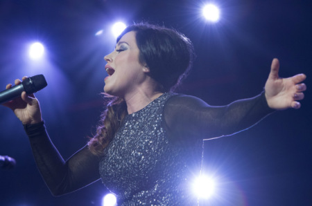 Kari Jobe performs on stage at 'A Night of Celebration in NYC with David Jeremiah & Friends' at Madison Square Garden on Thursday, Dec. 5, 2013.