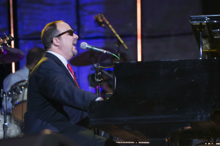 Gordon Mote performs on stage at 'A Night of Celebration in NYC with David Jeremiah & Friends' at Madison Square Garden on Thursday, Dec. 5, 2013.