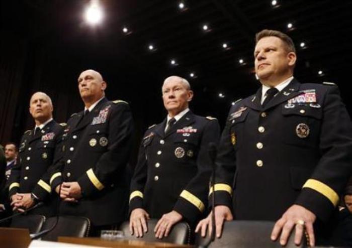 U.S. Army Generals stand ready to testify about pending legislation regarding sexual assaults in the military at a Senate Armed Services Committee on Capitol Hill in Washington, D.C., June 4, 2013.