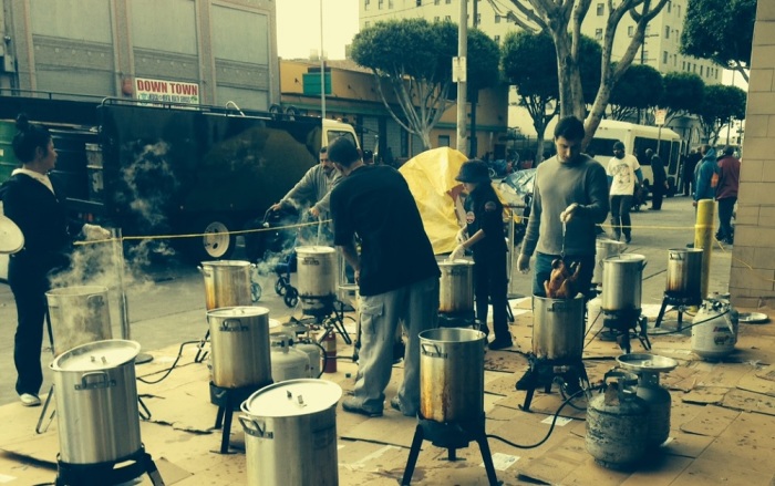 Workers at Union Rescue Mission roast turkeys as part of their holiday feeding efforts in Los Angeles, Calif.