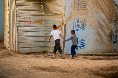 Visit with Syrian refugees at Za'atari Refugee Camp, Jordan. World Vision is providing flood control and a variety of GIK assistance to the refugees.