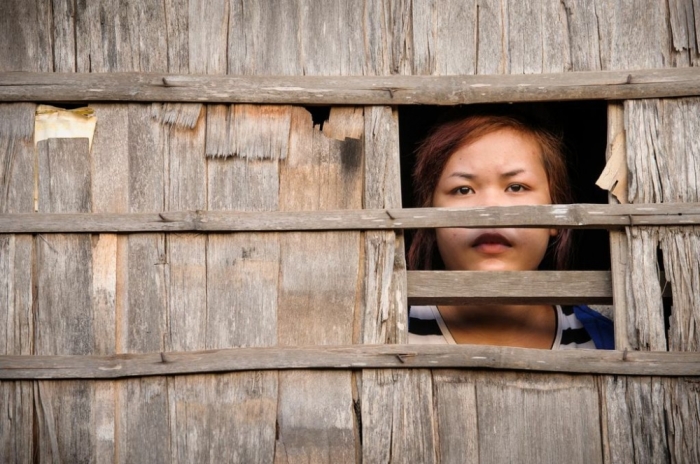 15-year-old Savoeun went to work in Leuk Daek in southeastern Cambodia. Leuk Daek is a place of rice fields and rivers, its scenery strewn with ornate pagodas that bespeak the country's Buddhist heritage. Savoeun quit school to work at the sewing factory when she was 12. Back then, she rode a bicycle to work. But on this day, the teenager took a motortaxi, her hands clutching a small bag containing the items she had been instructed to bring: her clothes and her sister's birth certificate. That, she'd had to steal. At the factory that morning, Savoeun's sister Simean was the first to notice. 'I did not see her working,' says Simean, 21. 'I asked where she was. People told me that she'd gone to work in Malaysia. I called my family.' In making that call, Simean set in motion a Cambodian-style Amber Alert. Savoeun's family, friends, local officials, co-workers, the police, community members, and the children of two villages joined in a singular task: bringing Savoeun home--alive.