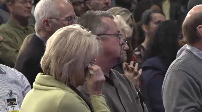 Congregants react to Pastor Ron Carpenter's news about attempting to reconcile with his wife, Hope Hilley Carpenter, during a sermon on Sunday, Jan. 5, 2013, at Redemption World Outreach Center in Greenville, S.C.