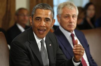 U.S. President Barack Obama holds a cabinet meeting at the White House in Washington January 14, 2014.