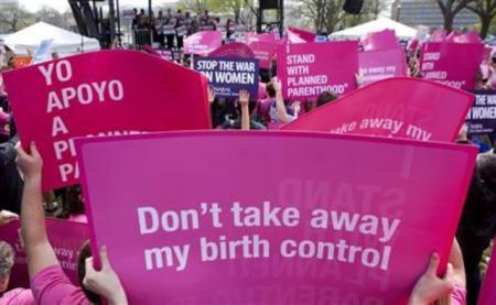 Members of Planned Parenthood, NARAL Pro-Choice America and more than 20 other organizations hold a 'Stand Up for Women's Health' rally in Washington, D.C. on April 7, 2011.