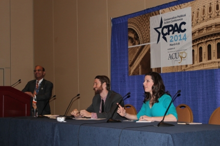 Colorado State Rep. Janak Joshi and radio producer Chris Beach laugh with 'Blogger of the Year' Mary Katharine Ham at the marijuana panel at the Conservative Political Action Conference in National Harbor, Md., March 7, 2014.