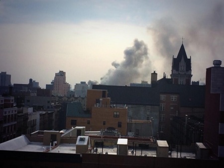 An building burns in East Harlem between 116th and Park Avenue on March, 12, 2014.