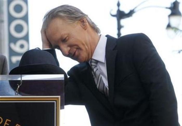 Comedian Bill Maher reacts as he waits for Hollywood Chamber of Commerce president and CEO Leron Gubler to finish his introduction of King at ceremonies unveiling Maher's star on the Hollywood Walk of Fame in Hollywood September 14, 2010.