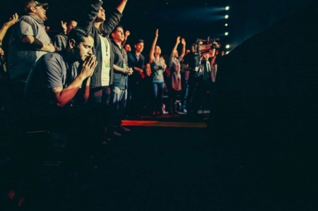 The two-day Catalyst West conference at Mariners Church in Irvine, Calif., includes time for worship and prayer, April 3, 2014.