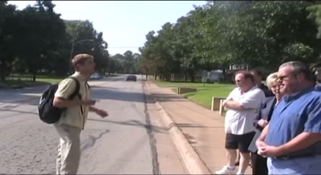 A member of the Texas-based Wells Church preaches outside a Catholic Church in 2010.