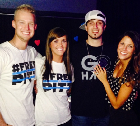 Founder and pastor of The Basement in Birmingham, Ala., Matt Pitt (right) poses with his wife Maegan and two supporters shortly after his release from the Shelby County jail on April 13, 2014.