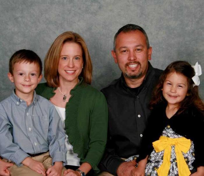 Pastor Robert McKeehan with his wife, Elizabeth, and their two children, John and Scarlett.