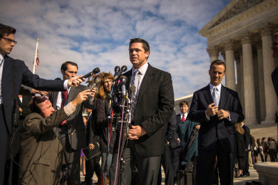 Greg Scott of the Alliance Defending Freedom speaks to reporters outside the U.S. Supreme Court after it heard arguments in the case of Town of Greece, NY v. Galloway, in Washington November 6, 2013. The Supreme Court today heard the case concerning public prayers before town meetings and whether it violates the Constitution.